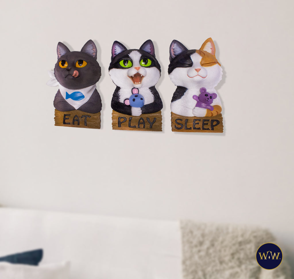 cat wall signs with the words " eat" "play" and "sleep" signs